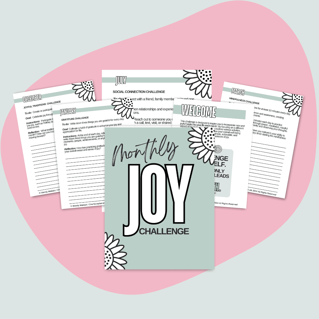 This is a mockup of Monthly Joy Challenge in the center. Surrounding the cover are several open pages from the workbook. The workbook cover and pages are decorated with floral designs, and the background is a soft pink abstract shape on a lighter pink base.