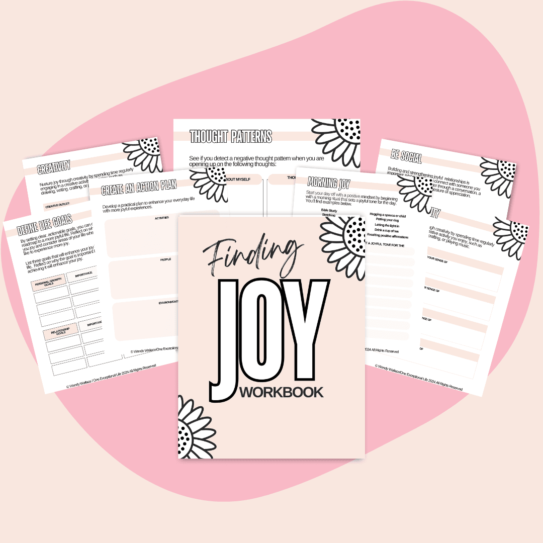The image showcases a set of eight colorful cards arranged in two rows, each with a title related to joy-themed activities. This title is:  "Finding Joy Workbook,"  Each card features floral accents and is set against a white background with a pink abstract shape.